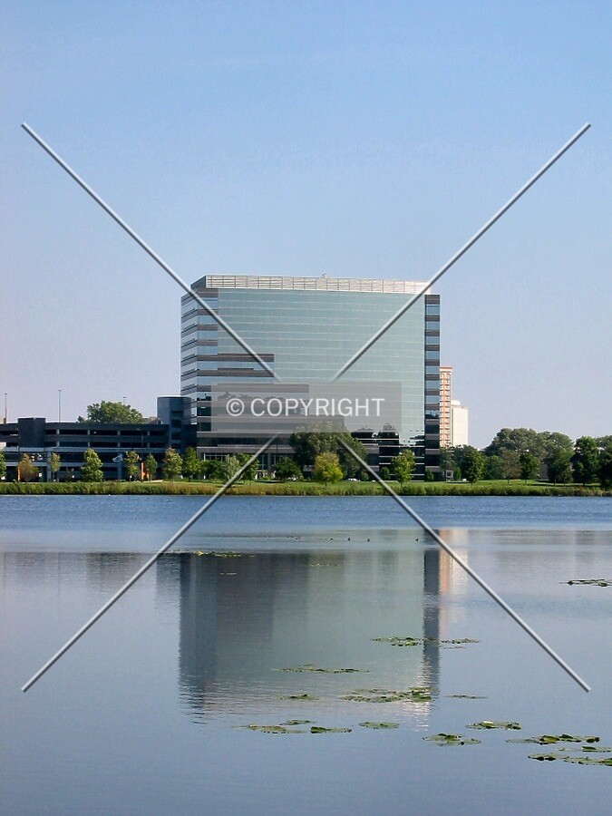Distant view to the north, reflected in Hyland Lake