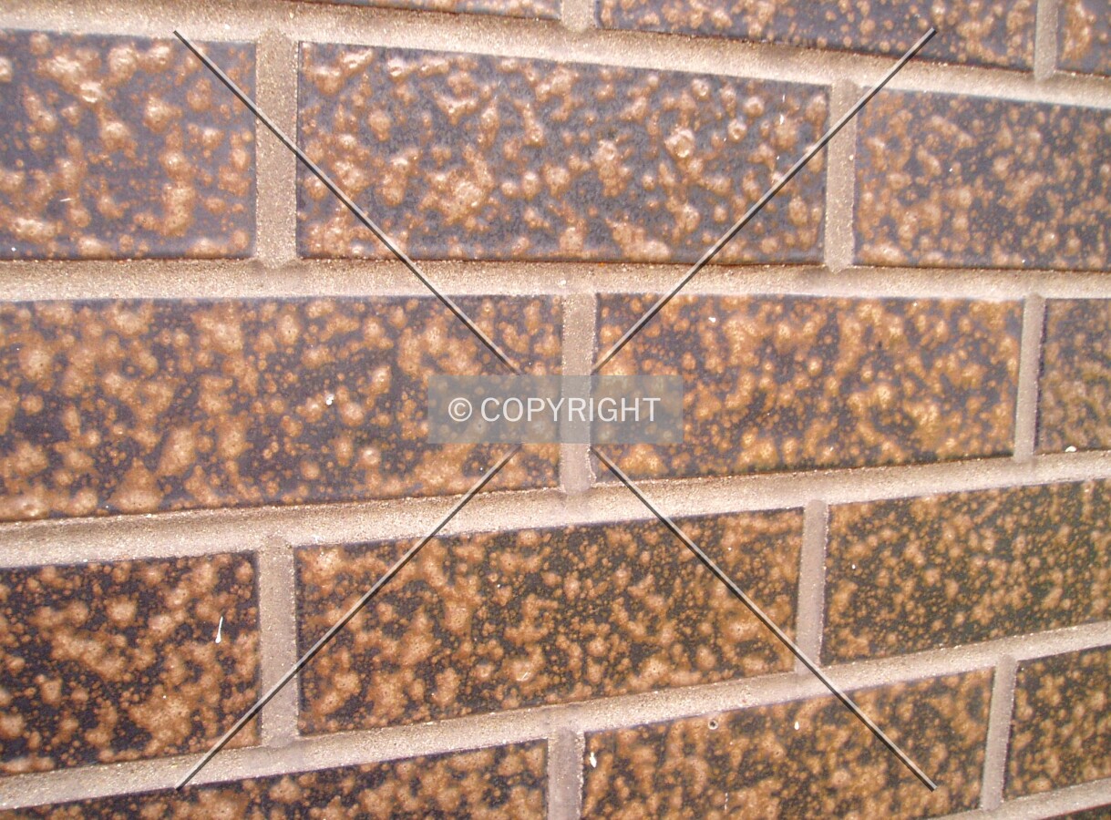 Brick facade on the ground floor, which is darker than the 12 upper floors