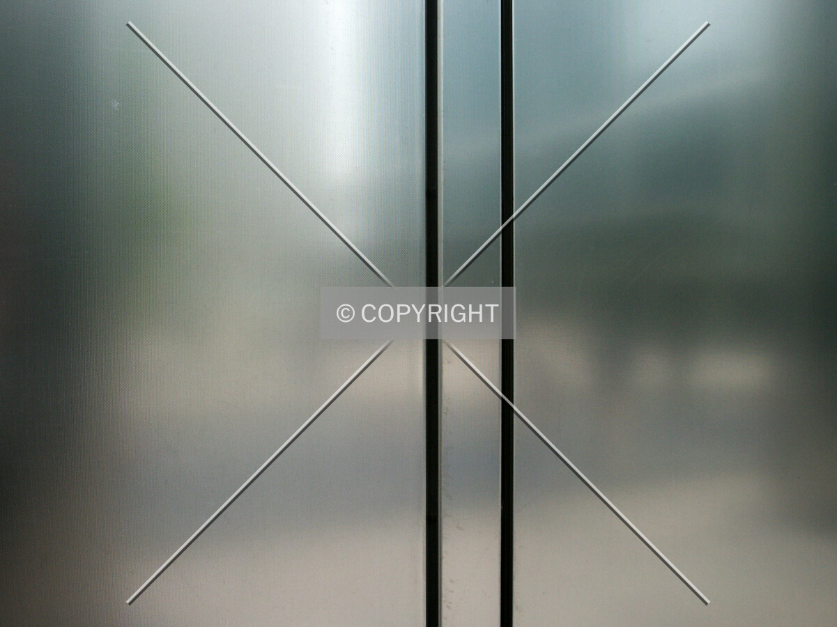Close-up of the stainless steel on a perimeter column