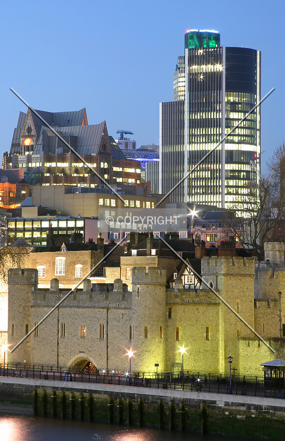Rising above the Tower of London from Tower Bridge at dusk