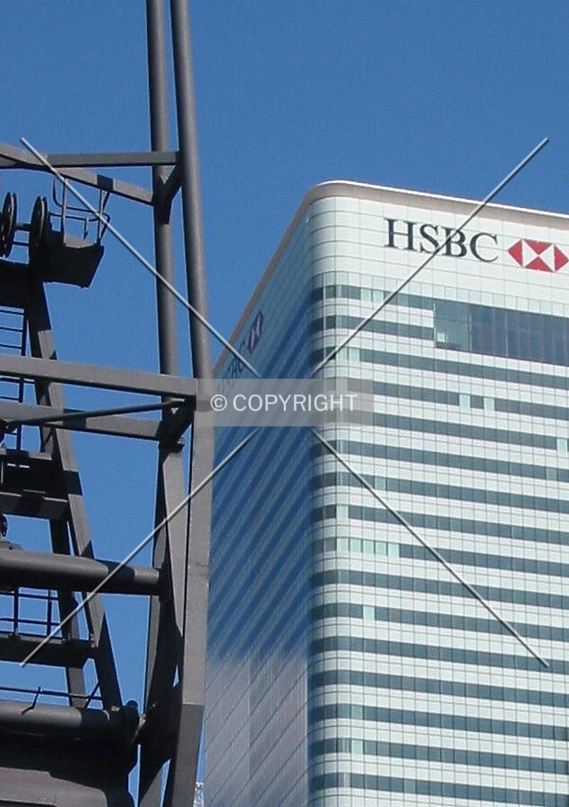 HSBC's brash logo juxtaposed against an old dock crane