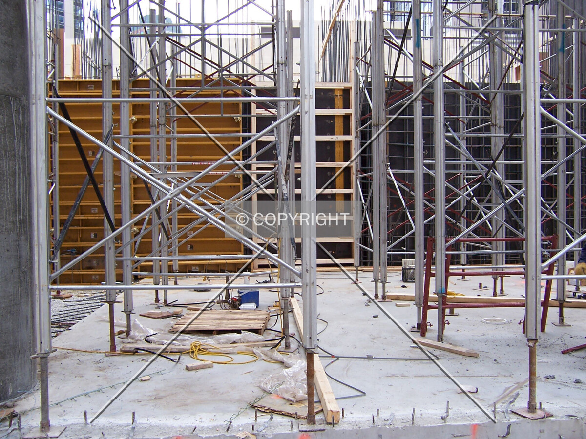 Looking south into the first floor from Ohio Street. Scaffolding in the foreground and the formation of the elevator core in the background