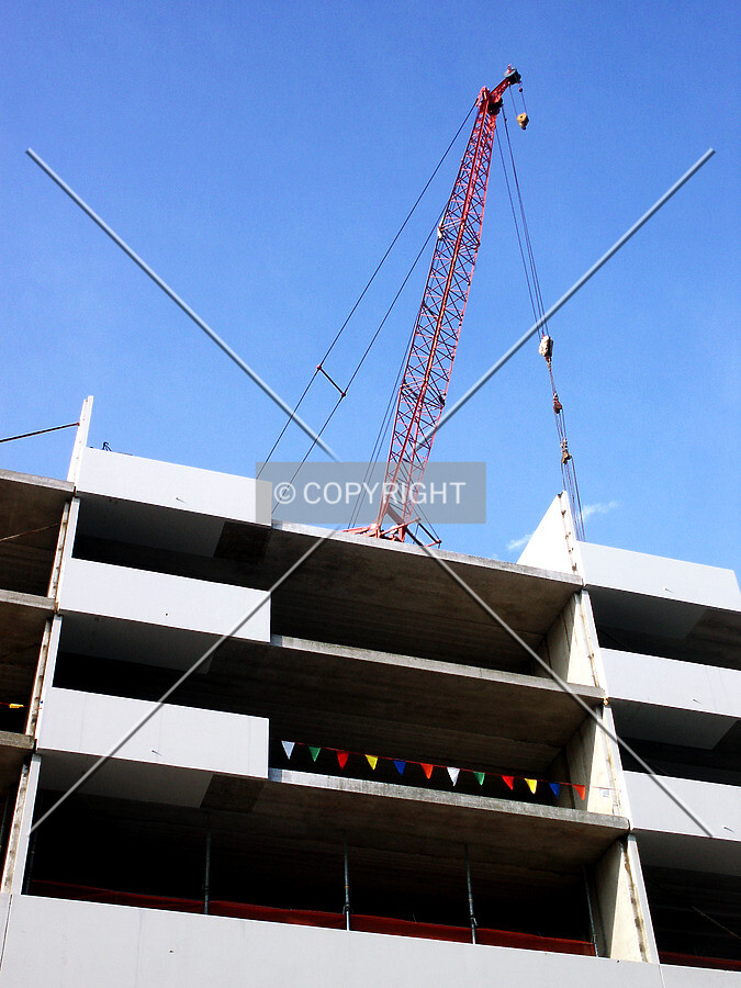 Looking up at the crane from Ontario Street