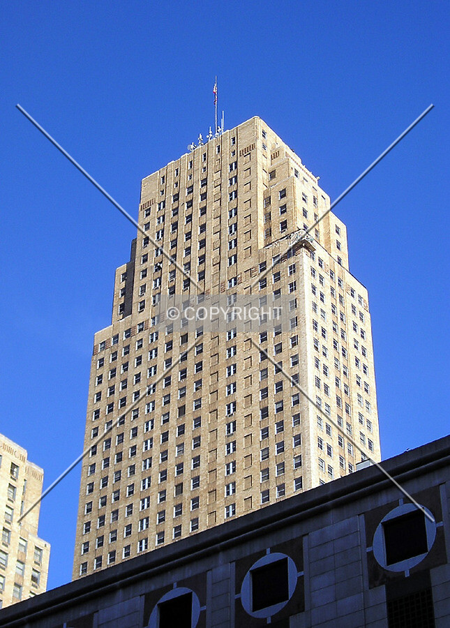 Southeast corner rising over the Tower Place Garage, from Race Street