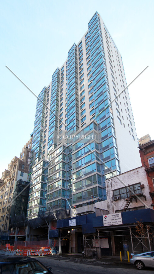 Looking up from West 37th Street