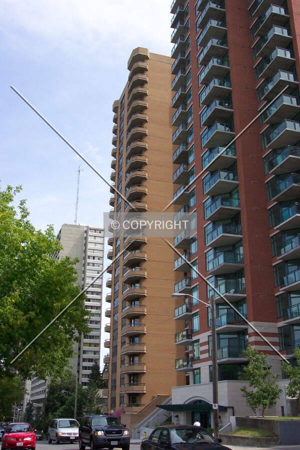 View from the corner of Laurier Avenue West and Bronson Avenue facing east with the Laurier Tower in foreground