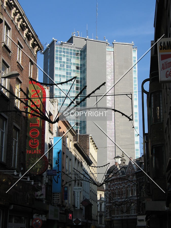 Looking up from Rue du Collège