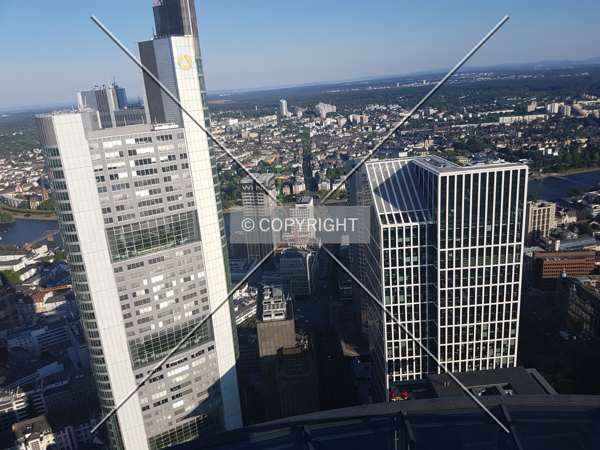 Panorama of Frankfurt with the white top of the TaunusTurm skyscraper on the right and Commerzbank Tower on the left