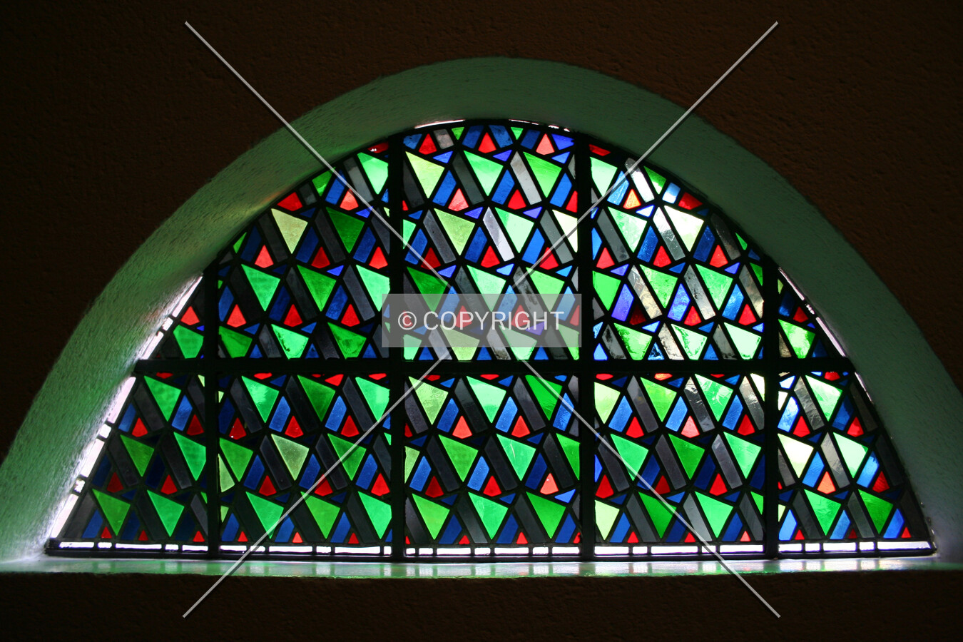 Arched window near the entrance