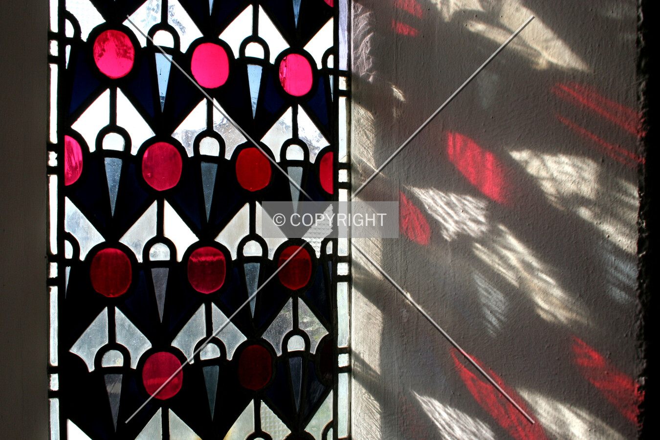 Stained glass and its shadow