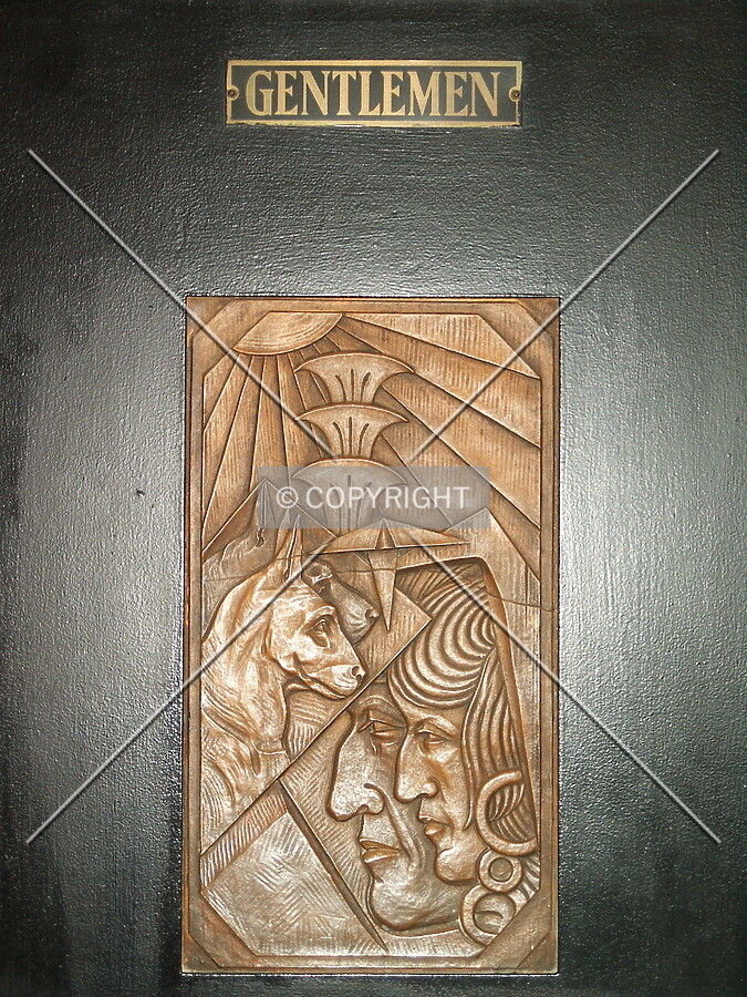 Men's room sign by the ballroom