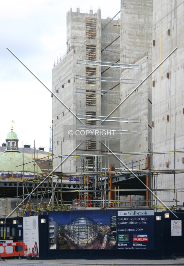 View northeast across Cannon Street of cores and emerging steelwork from Dowgate Hill