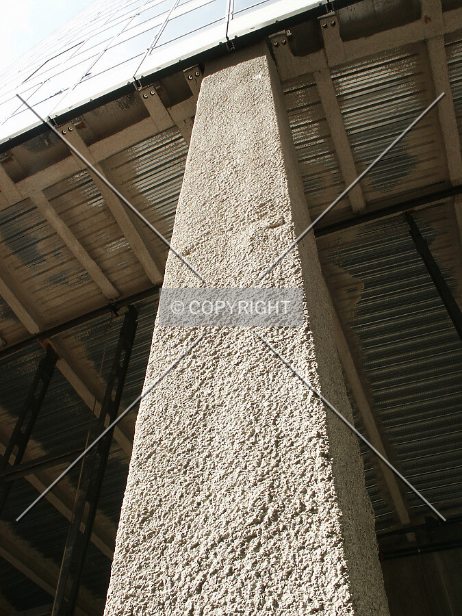 Looking up a steel column with fireproof coating