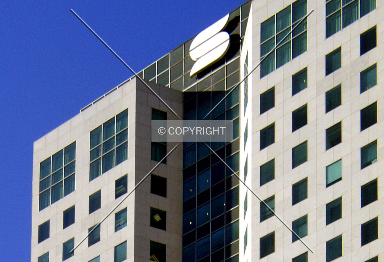 Detail of the upper floors and signage on the southern side