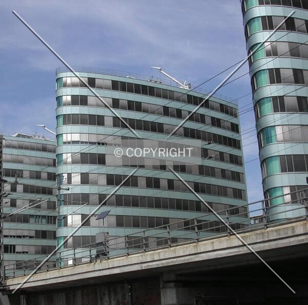 The building between its companion towers