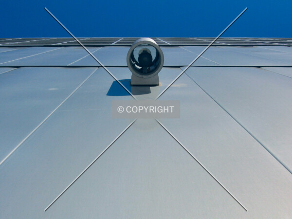 Looking up from 4th Street North, with a light fixture