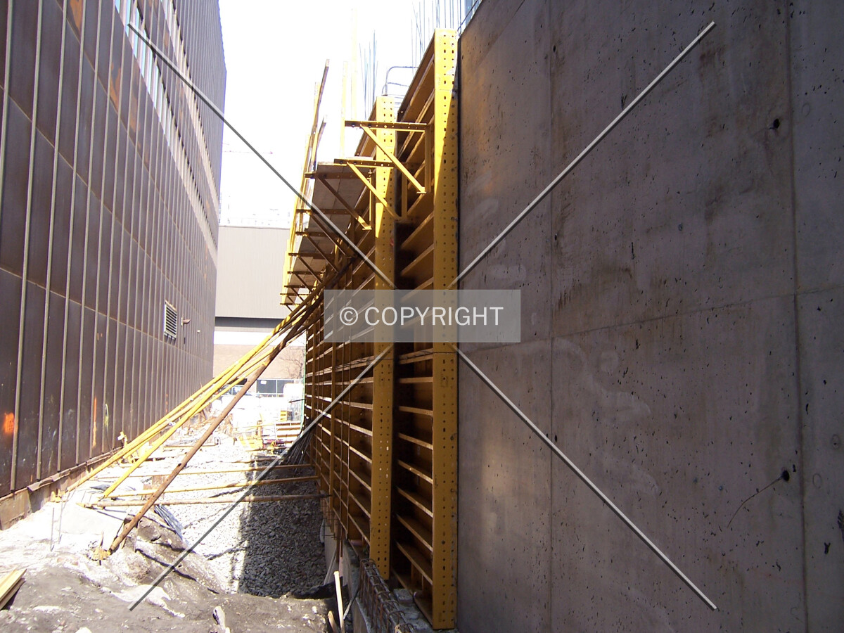 Concrete forms shaping the western wall of the parking garage