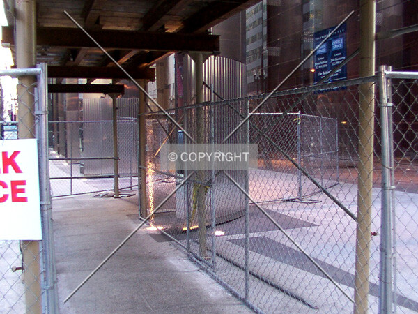 Construction canopy on Dearborn, during installation of the cornice