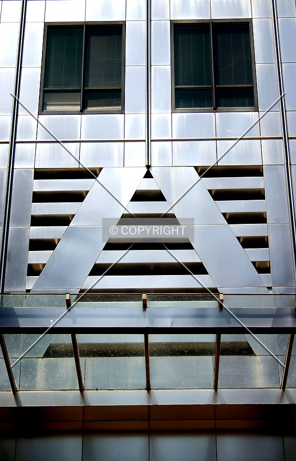 The stainless steel 'trees' above the entrance floor recall those on New York City's Twin Towers of the World Trade Center