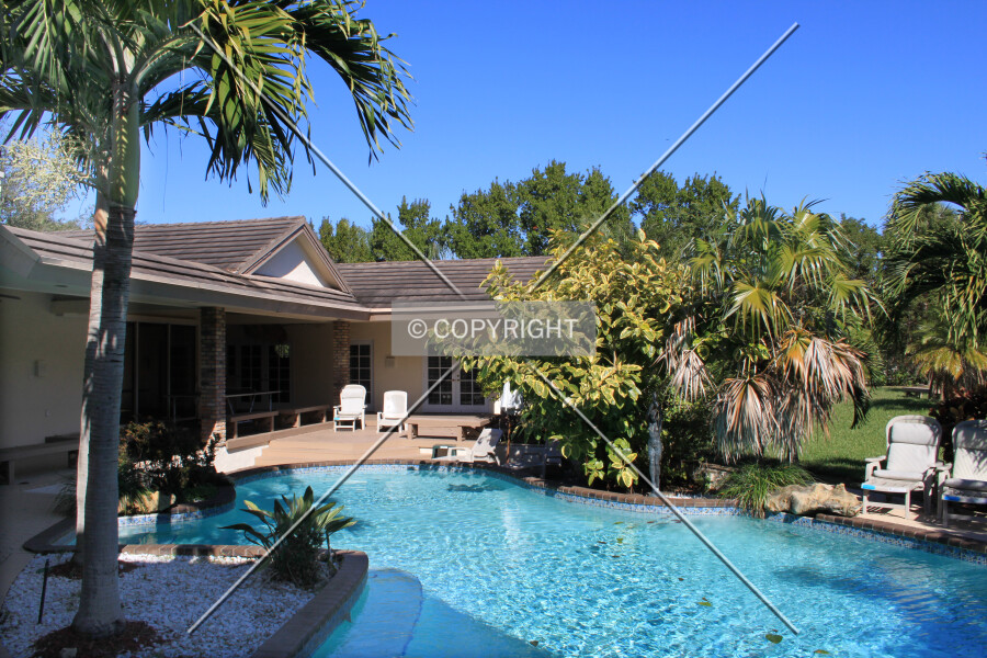 Pool in front of a house