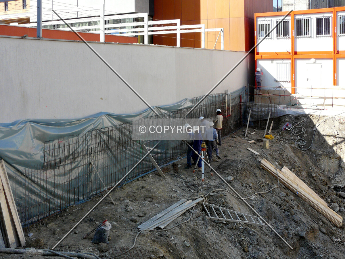 Property wall being built on the southwest side