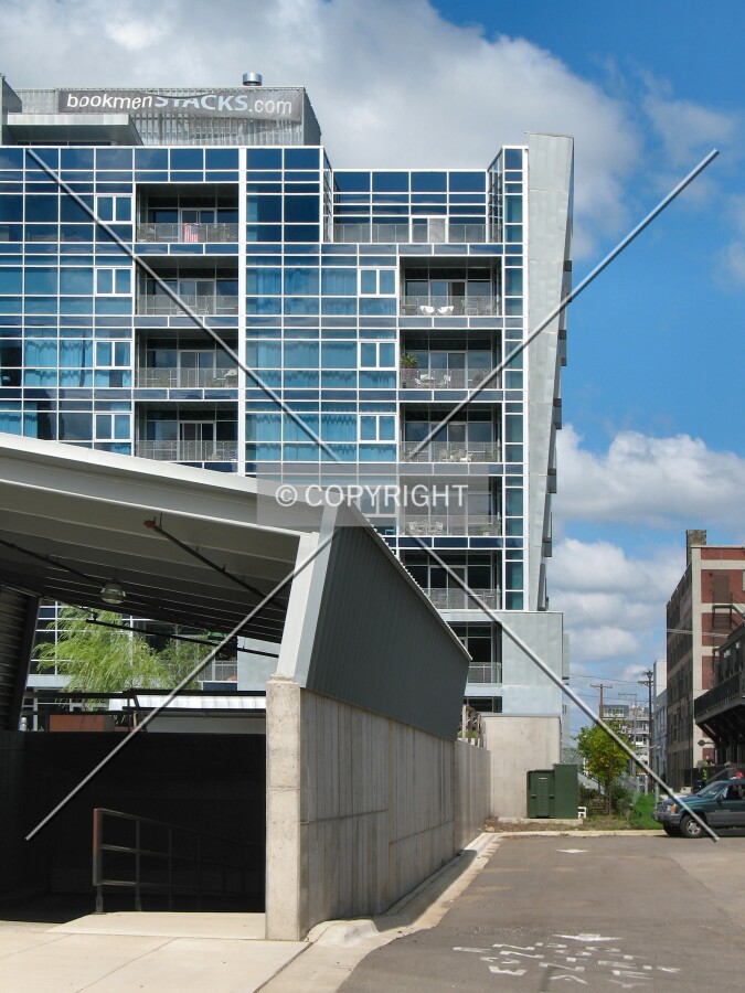 View to the northwest from 5th Avenue North, entrance to the garage on the left, with the leaning facade readily visible
