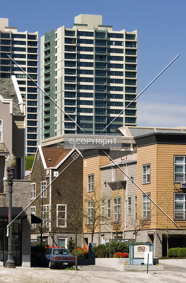 As seen from River Place, rising in the distance beyond the nearer, shorter condos