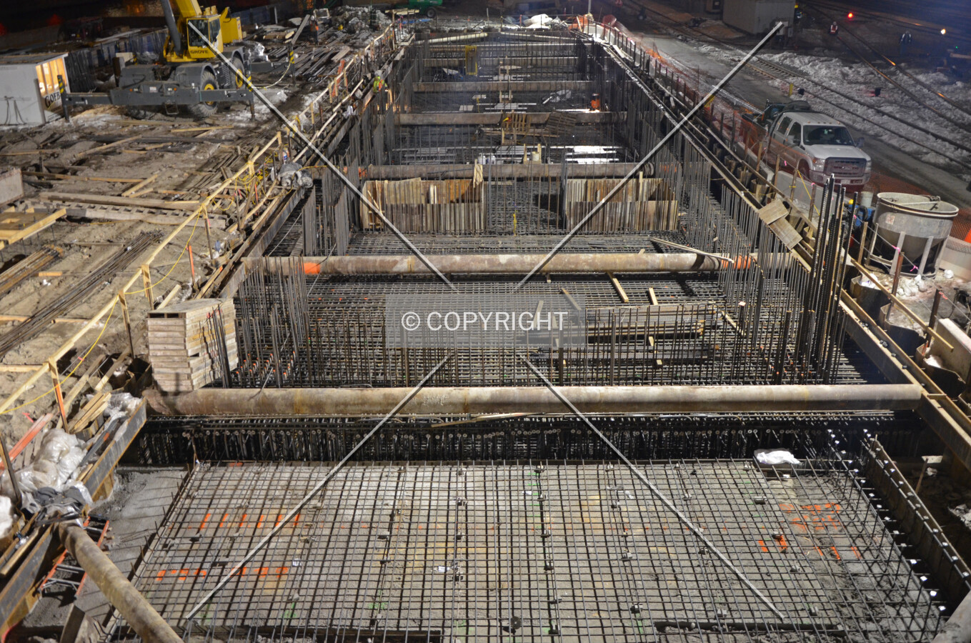 Looking south from Lake Street with rebar in the foundation mat shortly before the concrete pour begins; February 13, 2015.