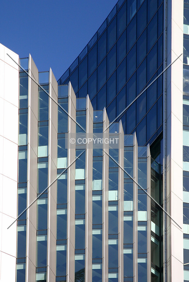 The Fenchurch Avenue façade from Leadenhall Place showing the glass and metal parapet at top