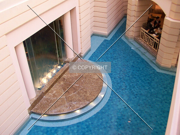 Waterway and platform at the south end of the atrium