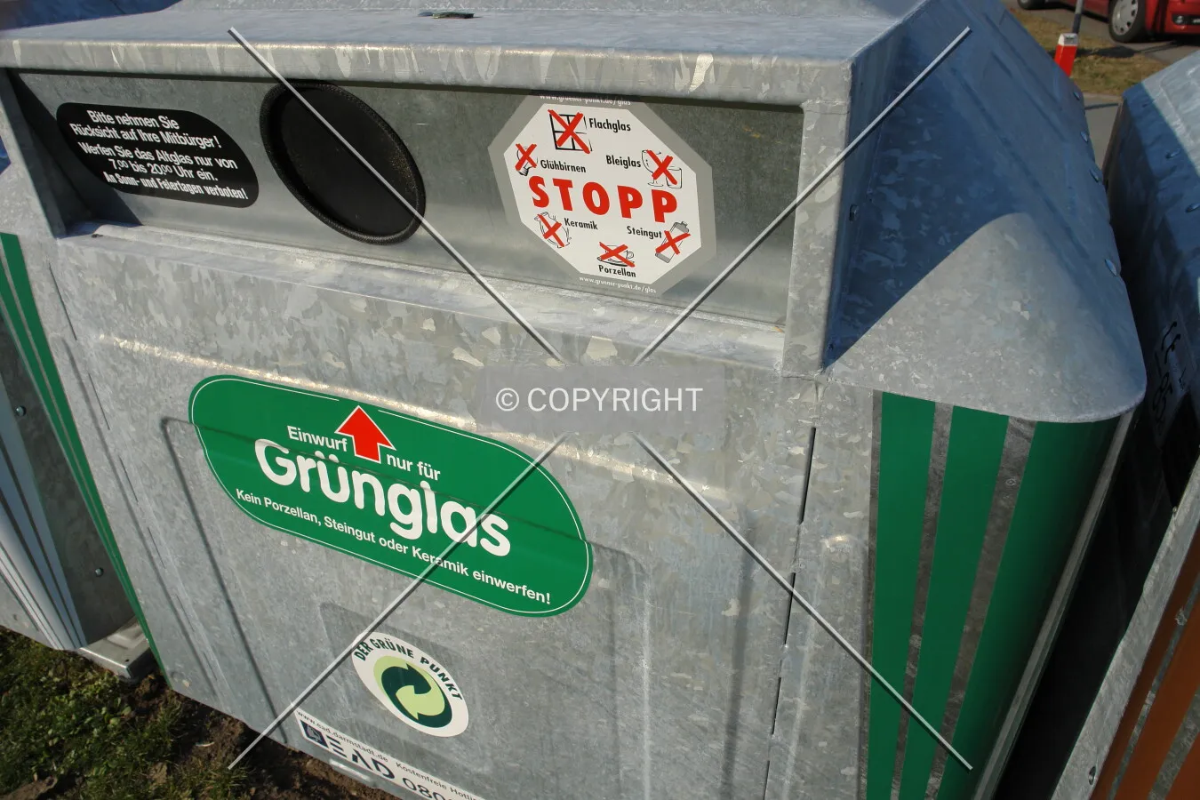A recycling container for green glass