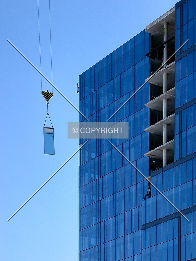 Window nearing its target on the incomplete north facade, from the northwest