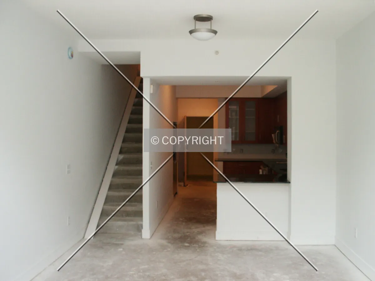 Inside the easternmost of the townhomes