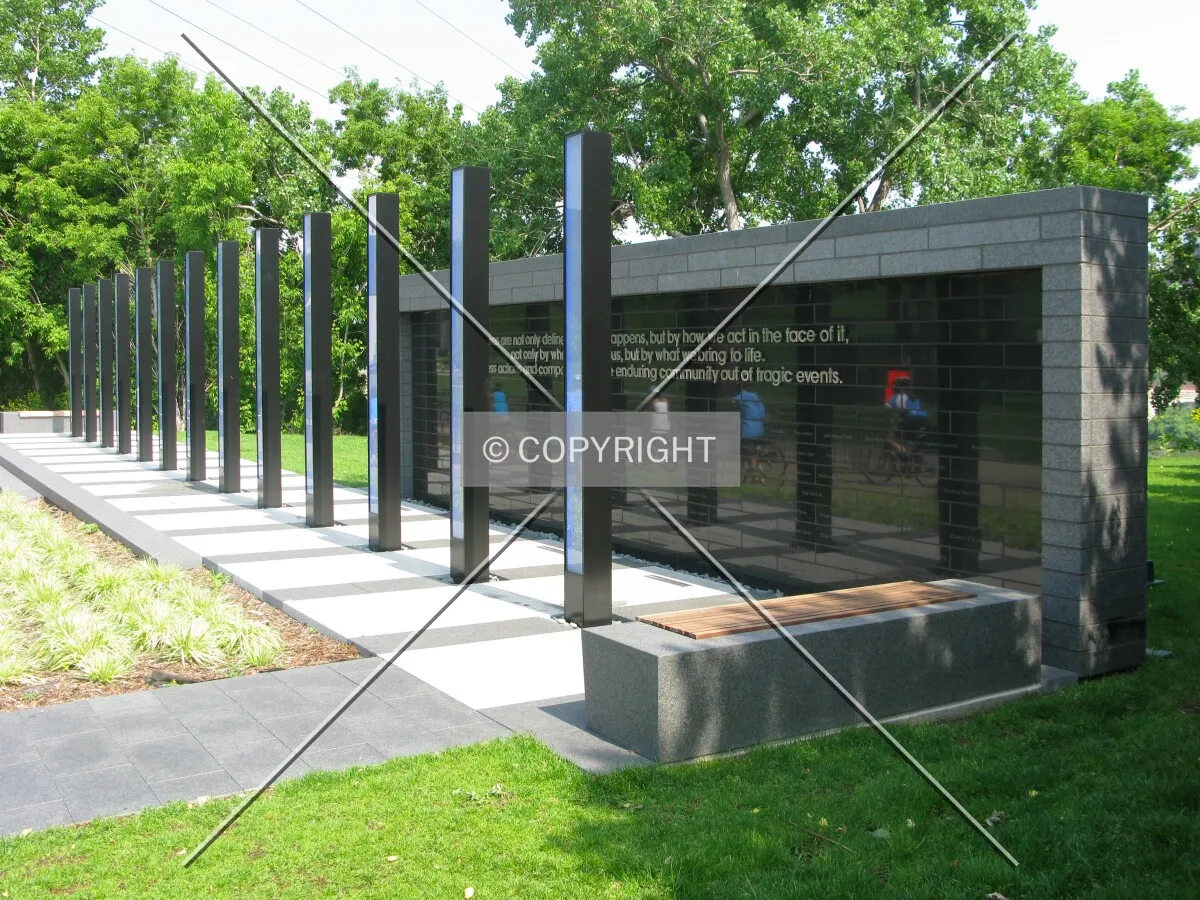 Main elevation reflecting cyclists along West River Parkway