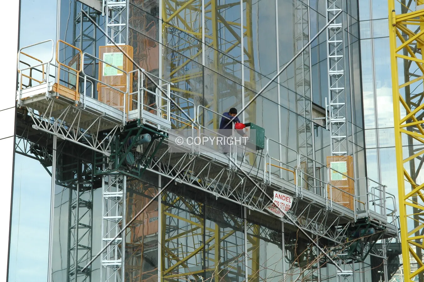 Platform working on the curtain wall of the main core