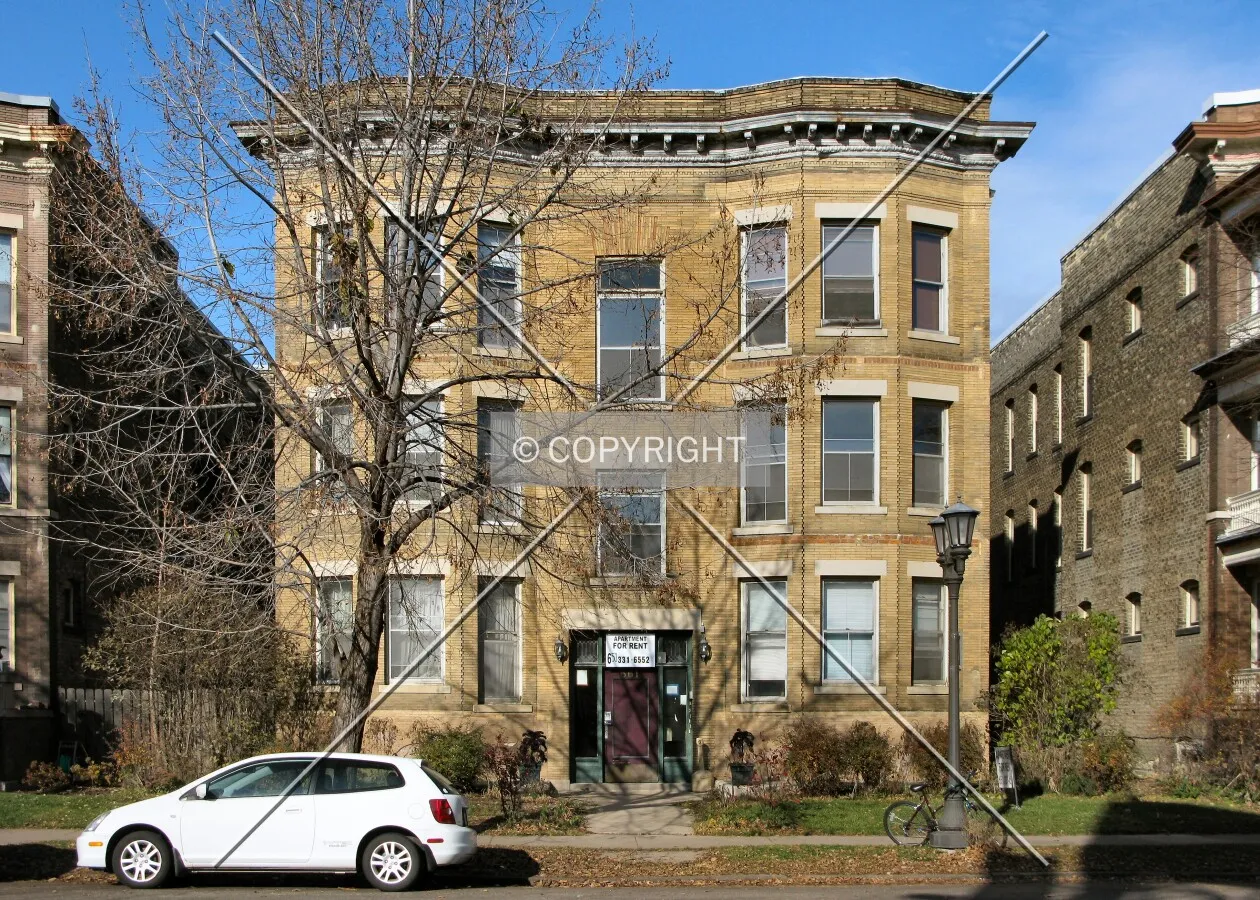 Full front elevation from across Grand Avenue