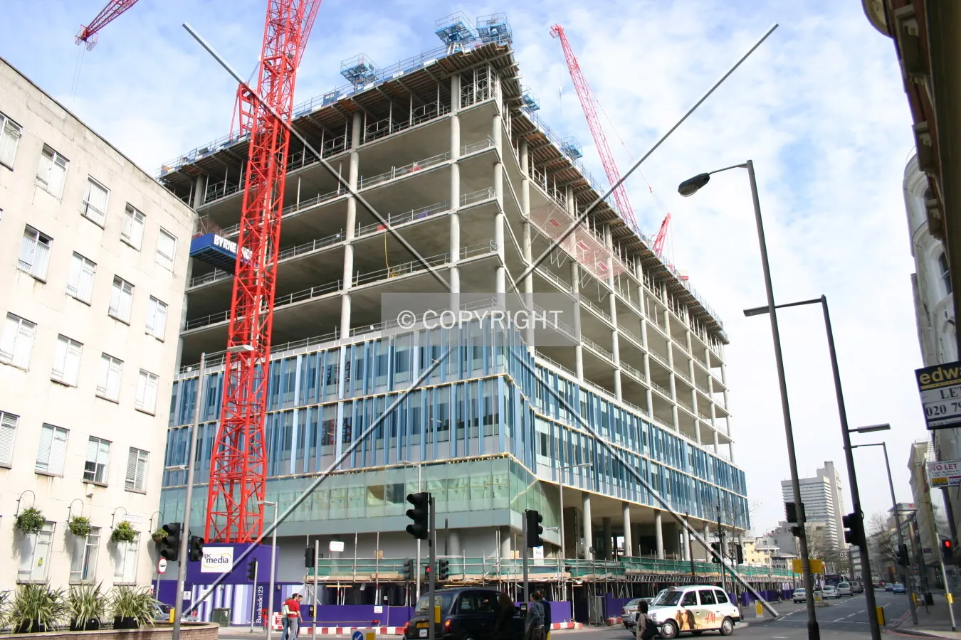 View from Southwark Street showing the glass curtain wall with projecting glass fins