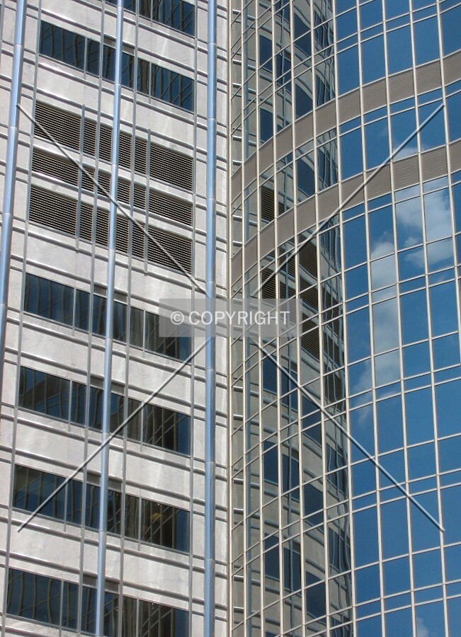 Undulating facade meets linear facade, from the southwest