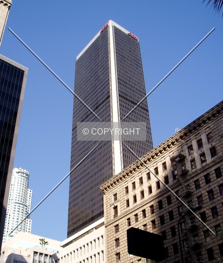 Looking up from one block to the southeast, with US Bank Tower in the left background