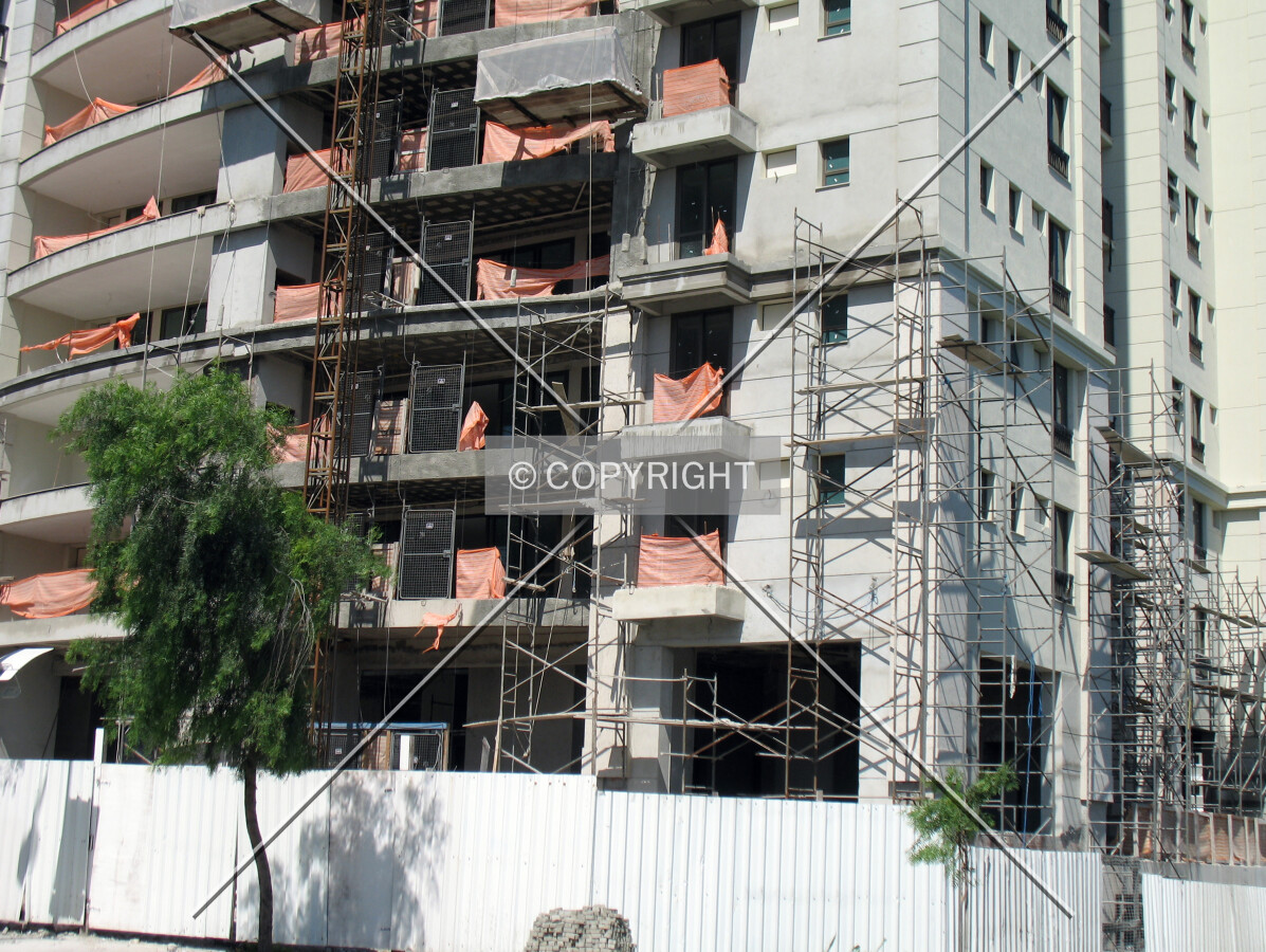 Dismantling the scaffolding on the lower floors