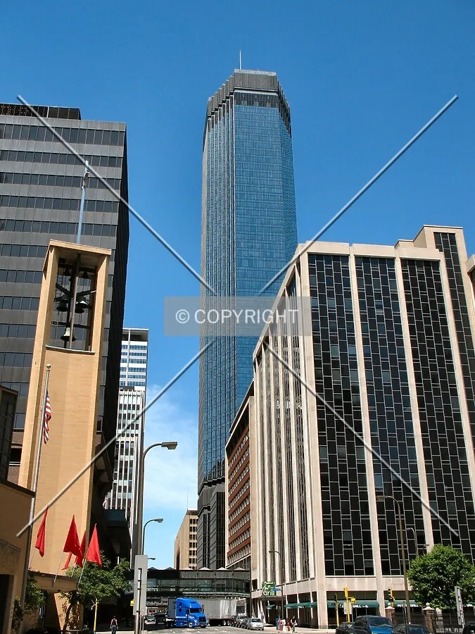 Rising with authority over 8th Street South, the neighbors bow in deference