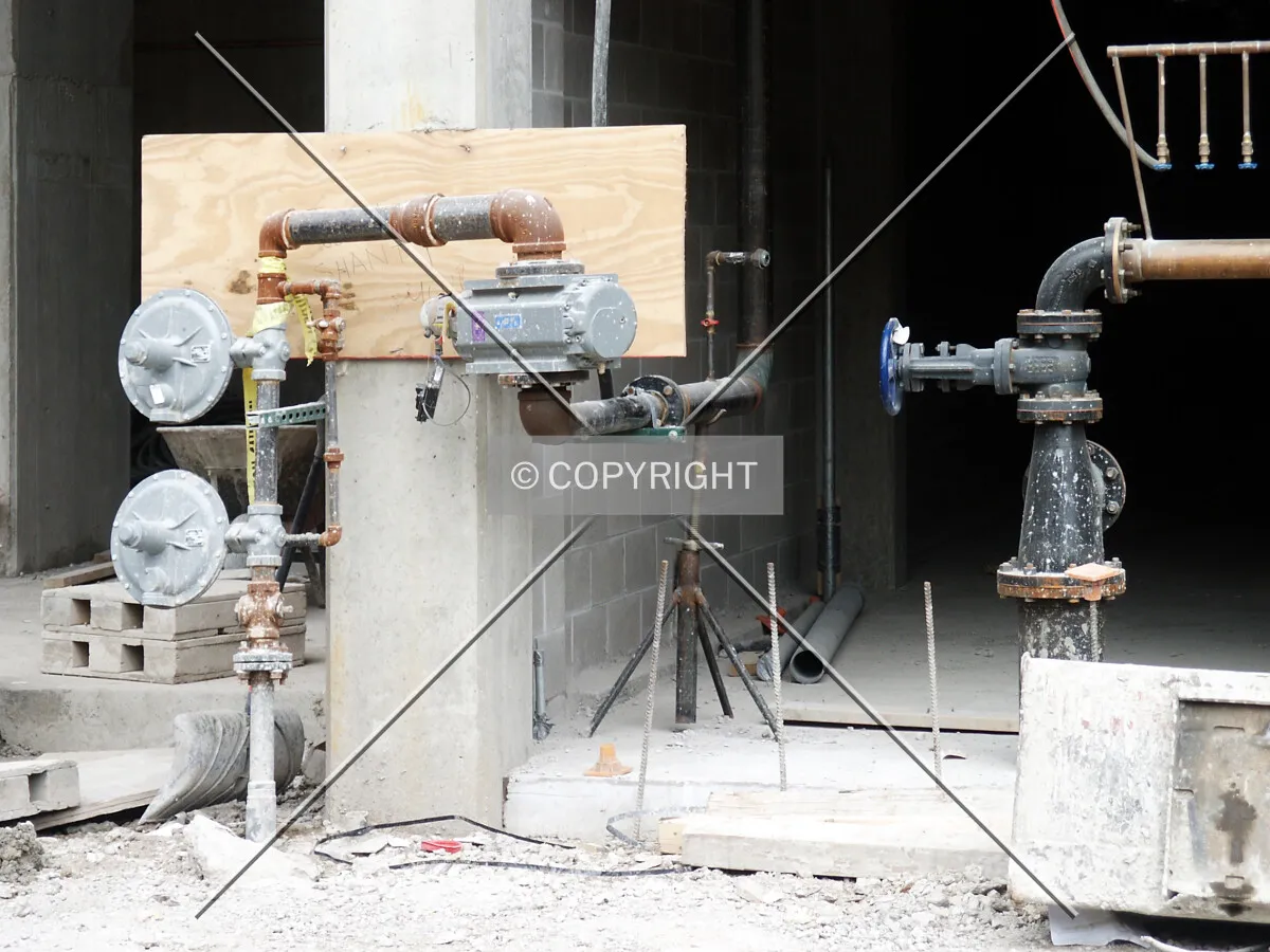 Plumbing at ground level on the Grace Street side