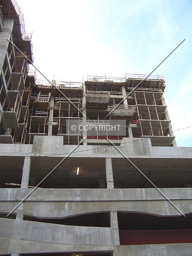 View of the building’s eastern wing above the parking podium from Institute Place