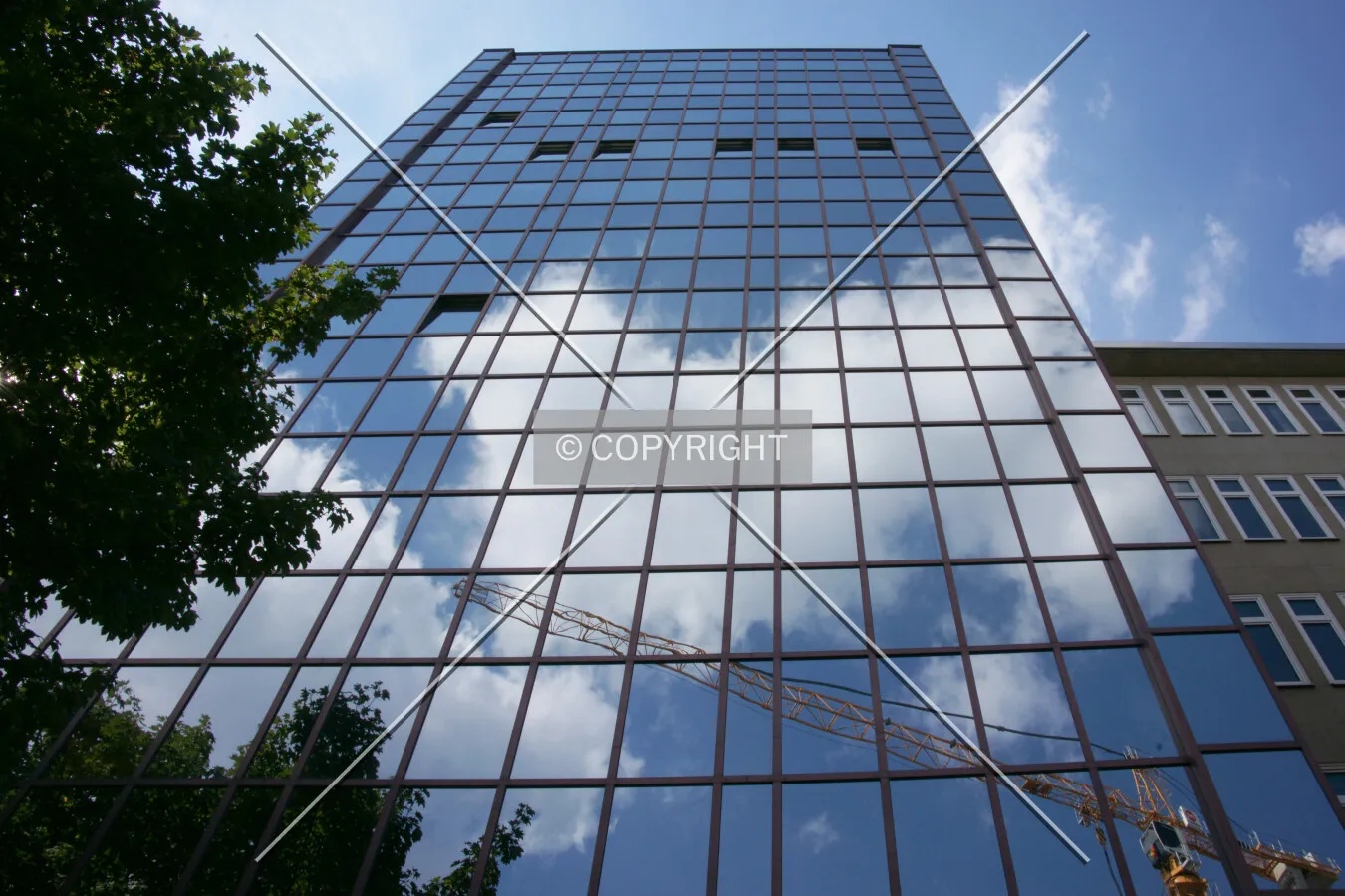 Clouds reflecting in the glass facade