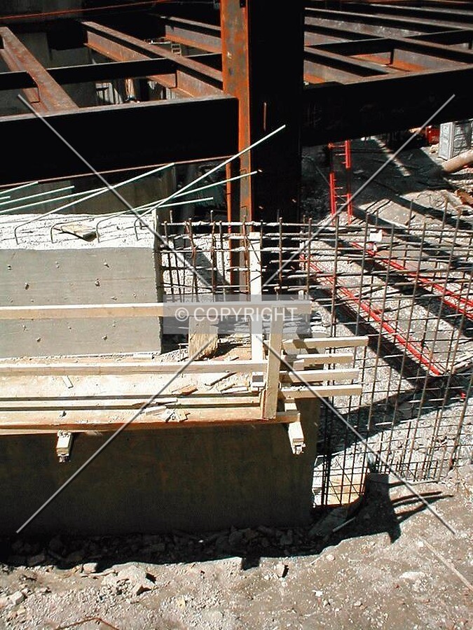 Incomplete cement form and rebar along Monroe Street
