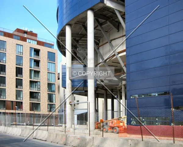 Under the future thrust stage theater, from 2nd Street South