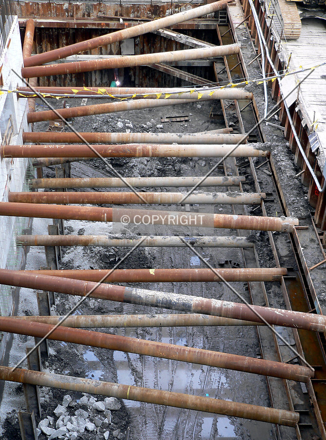 Several layers of raker beams on the east side of the core