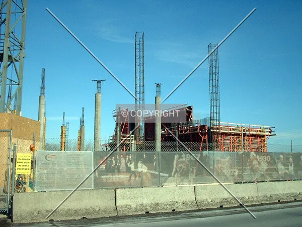 The first wall rising, from 2nd Street