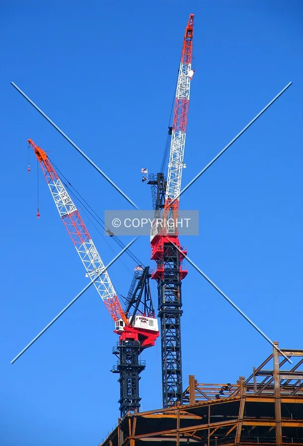 Construction cranes, seen from the east across the Schuylkill River