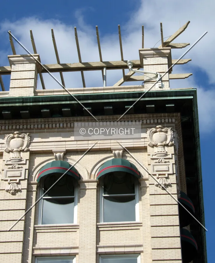 Cornice detail at Innes and Main from the southwest